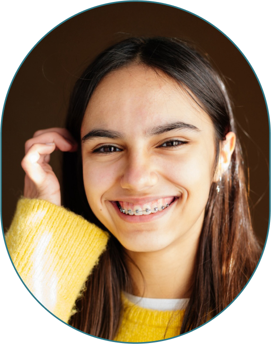 Smiling Teen Girl Wearing Braces in St. Louis, MO