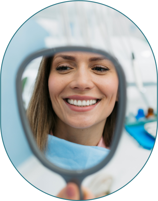 Smiling Girl In Orthodontist Office Looking In Mirror