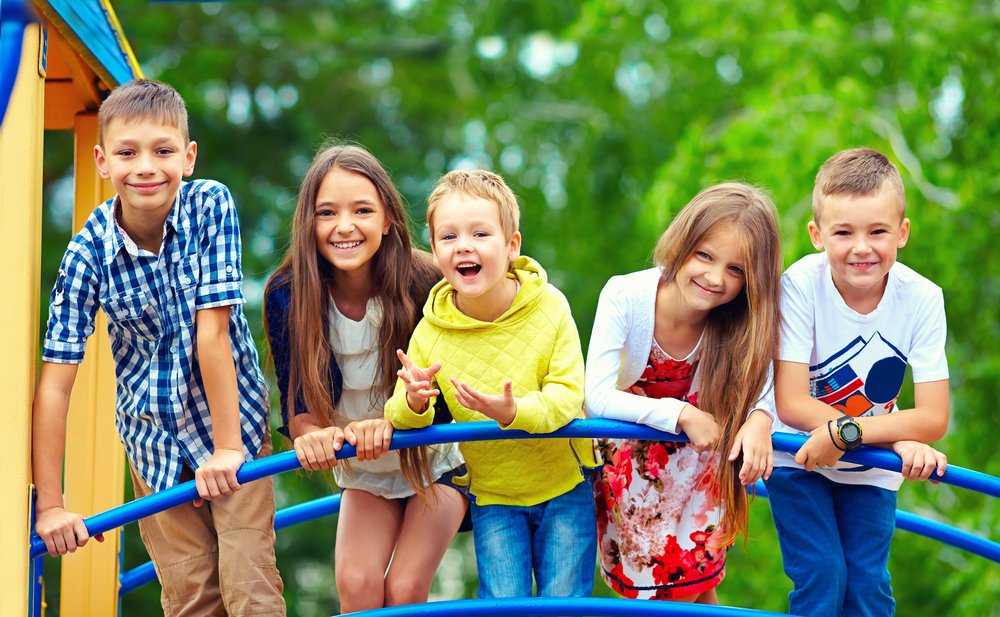 Smiling Group Of Children On A Playground