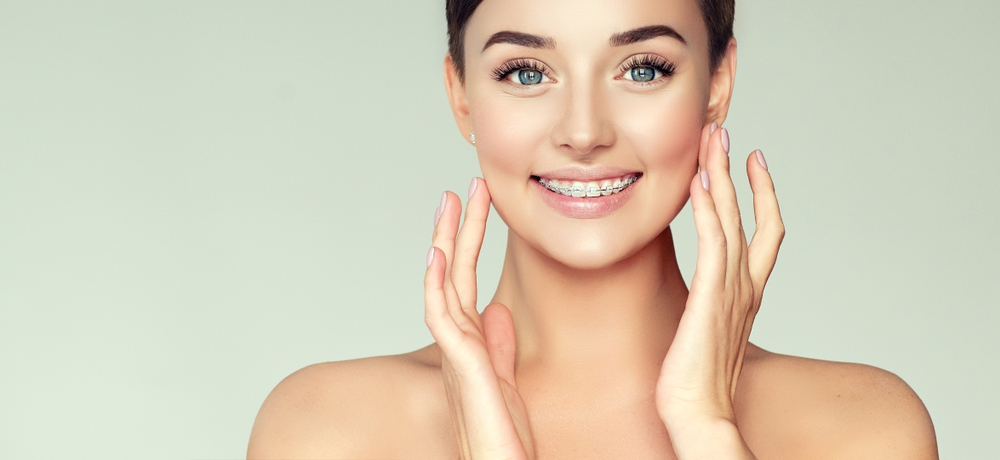 smiling woman wearing braces