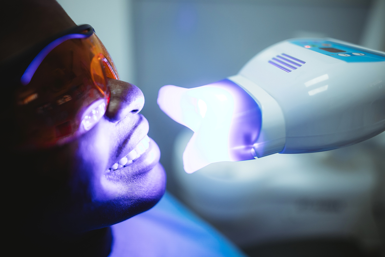 Young Woman Getting Dental Treatment.